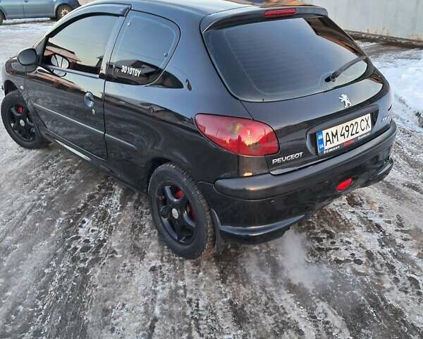 Чорний Пежо 206, об'ємом двигуна 1.4 л та пробігом 380 тис. км за 4200 $, фото 3 на Automoto.ua