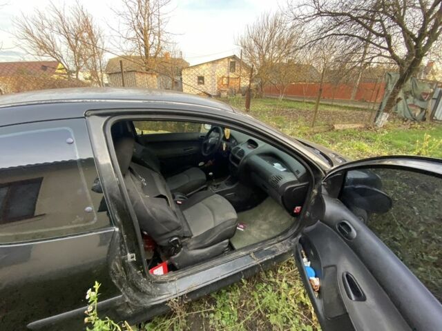 Черный Пежо 206, объемом двигателя 1.6 л и пробегом 237 тыс. км за 700 $, фото 6 на Automoto.ua