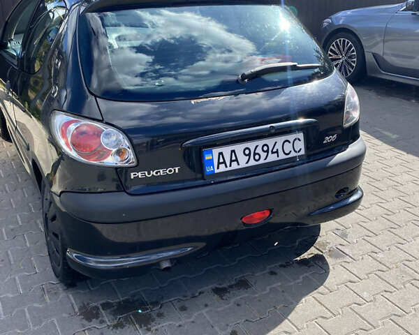 Чорний Пежо 206, об'ємом двигуна 1.1 л та пробігом 208 тис. км за 2500 $, фото 4 на Automoto.ua