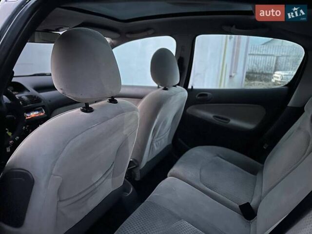 Черный Пежо 206, объемом двигателя 2 л и пробегом 383 тыс. км за 2800 $, фото 5 на Automoto.ua