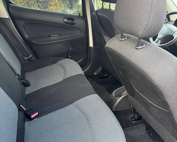 Черный Пежо 206, объемом двигателя 1.36 л и пробегом 142 тыс. км за 3500 $, фото 6 на Automoto.ua