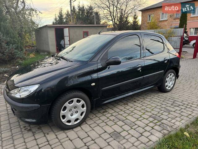 Черный Пежо 206, объемом двигателя 1.36 л и пробегом 142 тыс. км за 3500 $, фото 3 на Automoto.ua