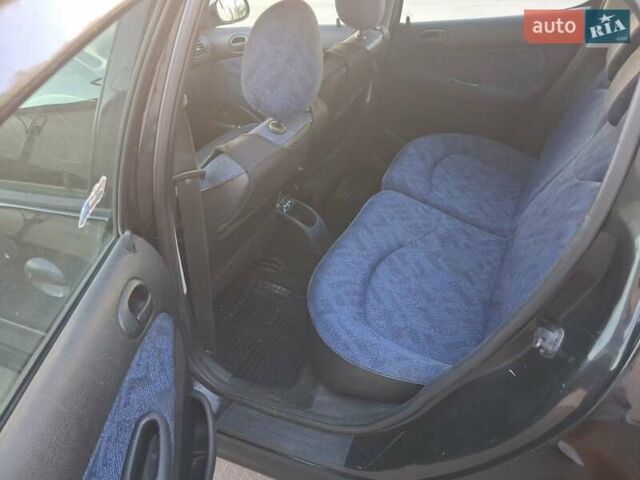 Черный Пежо 206, объемом двигателя 1.59 л и пробегом 176 тыс. км за 3000 $, фото 14 на Automoto.ua