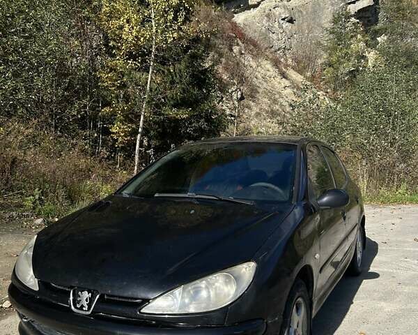 Черный Пежо 206, объемом двигателя 1.36 л и пробегом 355 тыс. км за 2650 $, фото 8 на Automoto.ua
