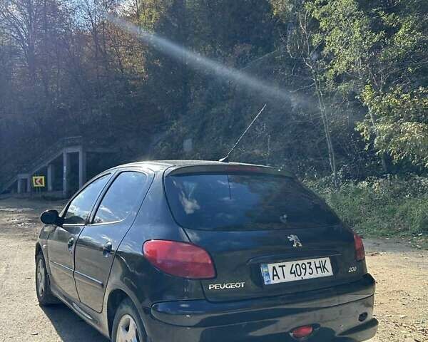Черный Пежо 206, объемом двигателя 1.36 л и пробегом 355 тыс. км за 2300 $, фото 2 на Automoto.ua