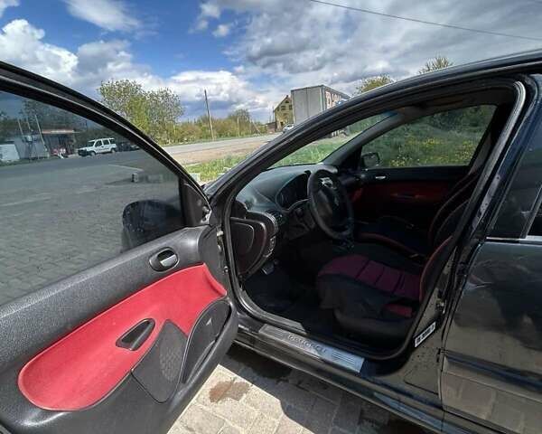 Черный Пежо 206, объемом двигателя 1.36 л и пробегом 355 тыс. км за 2300 $, фото 7 на Automoto.ua