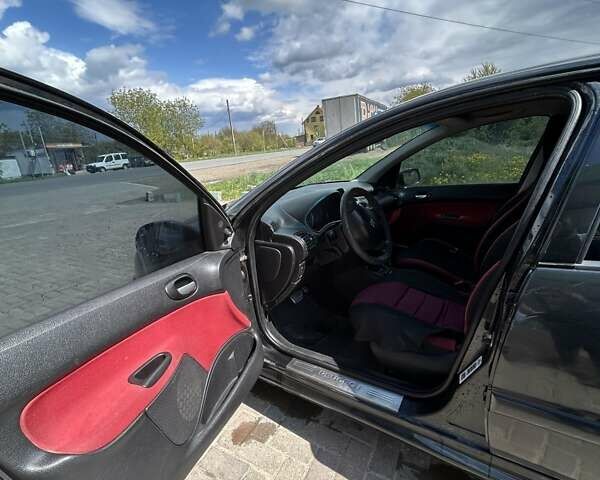 Черный Пежо 206, объемом двигателя 1.36 л и пробегом 355 тыс. км за 2650 $, фото 7 на Automoto.ua