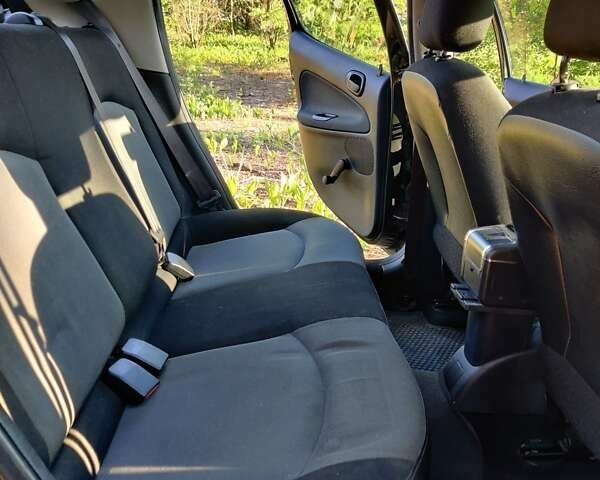 Чорний Пежо 206, об'ємом двигуна 1.36 л та пробігом 170 тис. км за 4000 $, фото 14 на Automoto.ua