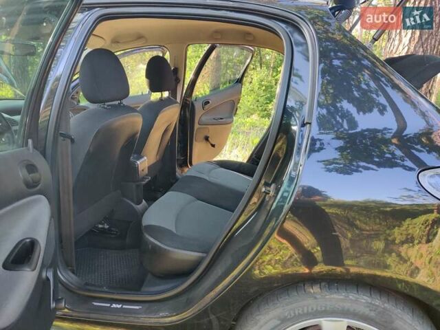 Чорний Пежо 206, об'ємом двигуна 1.36 л та пробігом 170 тис. км за 4000 $, фото 3 на Automoto.ua
