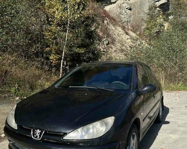 Черный Пежо 206, объемом двигателя 1.36 л и пробегом 355 тыс. км за 2300 $, фото 9 на Automoto.ua