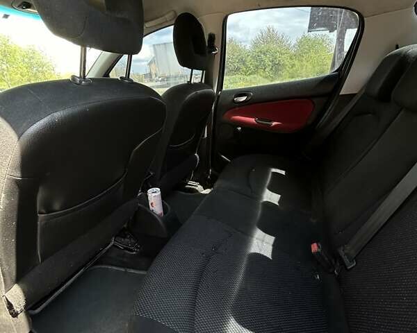 Черный Пежо 206, объемом двигателя 1.36 л и пробегом 355 тыс. км за 2650 $, фото 2 на Automoto.ua