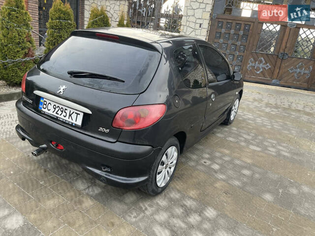 Чорний Пежо 206, об'ємом двигуна 1.36 л та пробігом 225 тис. км за 2600 $, фото 15 на Automoto.ua