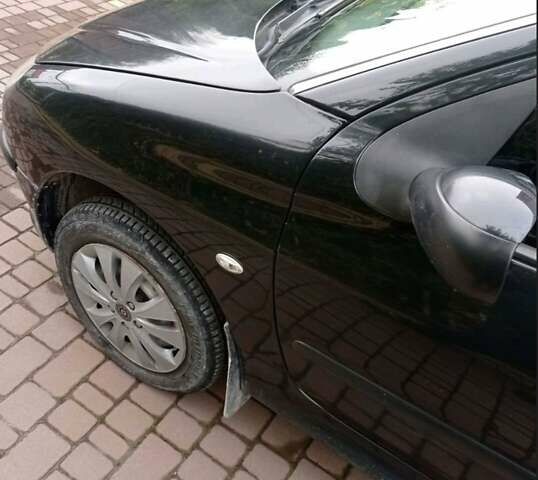 Чорний Пежо 206, об'ємом двигуна 1.4 л та пробігом 150 тис. км за 3000 $, фото 10 на Automoto.ua