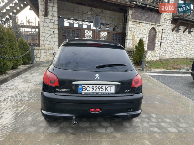 Чорний Пежо 206, об'ємом двигуна 1.36 л та пробігом 225 тис. км за 2600 $, фото 22 на Automoto.ua