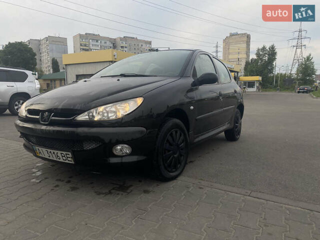 Черный Пежо 206, объемом двигателя 1.6 л и пробегом 231 тыс. км за 3700 $, фото 5 на Automoto.ua