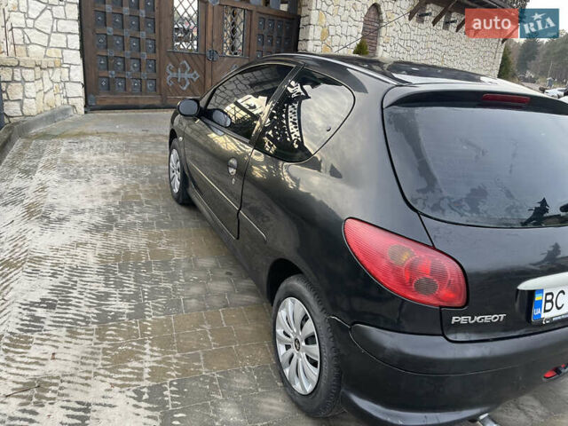 Чорний Пежо 206, об'ємом двигуна 1.36 л та пробігом 225 тис. км за 2600 $, фото 23 на Automoto.ua
