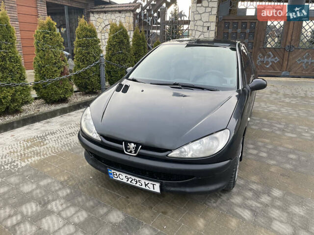 Чорний Пежо 206, об'ємом двигуна 1.36 л та пробігом 225 тис. км за 2600 $, фото 8 на Automoto.ua