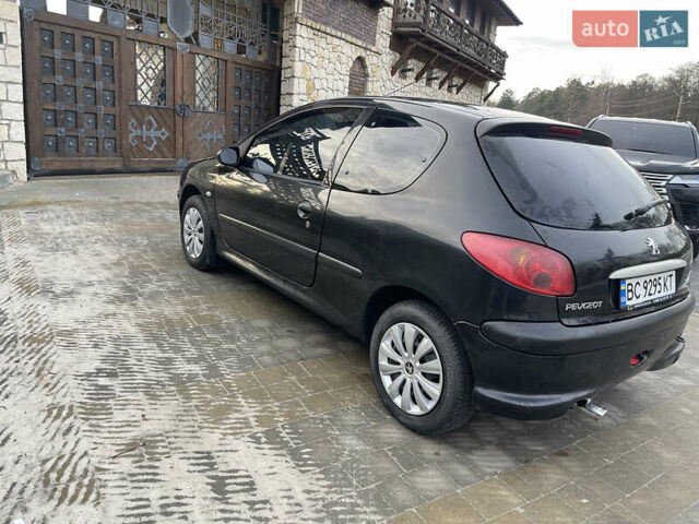 Чорний Пежо 206, об'ємом двигуна 1.36 л та пробігом 225 тис. км за 2600 $, фото 21 на Automoto.ua