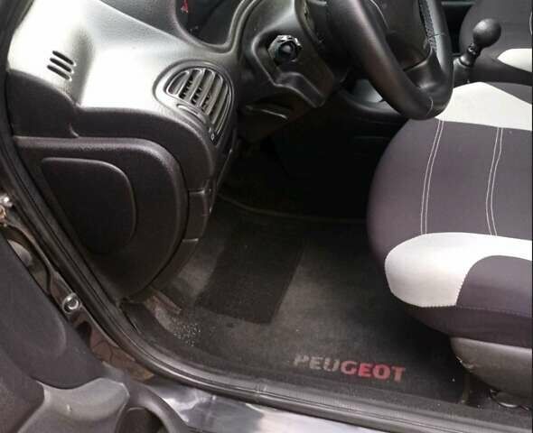 Чорний Пежо 206, об'ємом двигуна 1.4 л та пробігом 150 тис. км за 3000 $, фото 1 на Automoto.ua