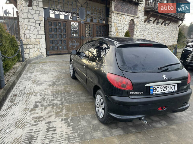 Чорний Пежо 206, об'ємом двигуна 1.36 л та пробігом 225 тис. км за 2600 $, фото 20 на Automoto.ua