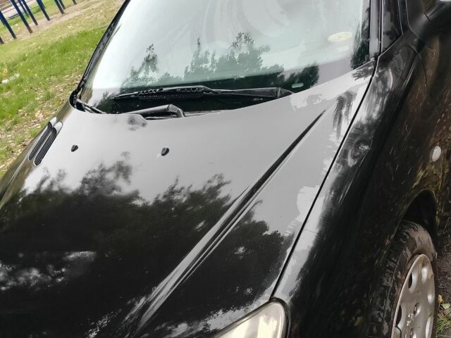 Черный Пежо 206, объемом двигателя 1.6 л и пробегом 136 тыс. км за 4000 $, фото 1 на Automoto.ua