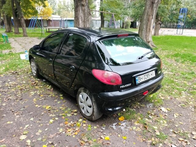 Черный Пежо 206, объемом двигателя 1.6 л и пробегом 136 тыс. км за 4000 $, фото 5 на Automoto.ua