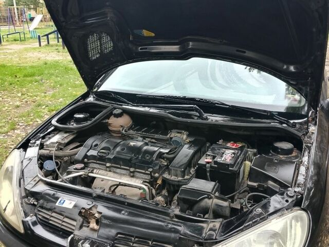 Черный Пежо 206, объемом двигателя 1.6 л и пробегом 136 тыс. км за 4000 $, фото 2 на Automoto.ua