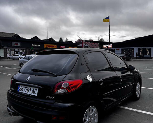 Чорний Пежо 206, об'ємом двигуна 1.4 л та пробігом 207 тис. км за 5900 $, фото 3 на Automoto.ua