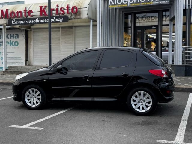 Черный Пежо 206, объемом двигателя 1.4 л и пробегом 207 тыс. км за 5900 $, фото 2 на Automoto.ua