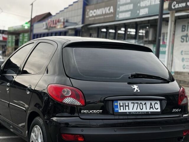 Черный Пежо 206, объемом двигателя 1.4 л и пробегом 207 тыс. км за 5900 $, фото 5 на Automoto.ua