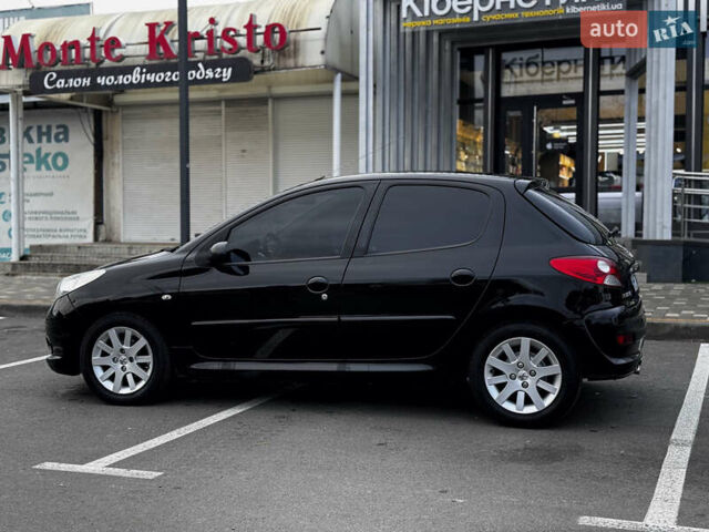 Чорний Пежо 206, об'ємом двигуна 1.4 л та пробігом 207 тис. км за 5900 $, фото 1 на Automoto.ua