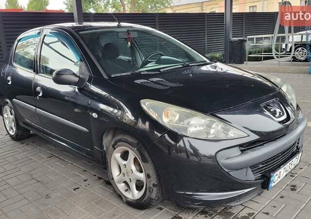Черный Пежо 206, объемом двигателя 1.1 л и пробегом 130 тыс. км за 4250 $, фото 1 на Automoto.ua