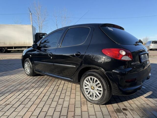 Черный Пежо 206, объемом двигателя 1.4 л и пробегом 152 тыс. км за 4500 $, фото 11 на Automoto.ua