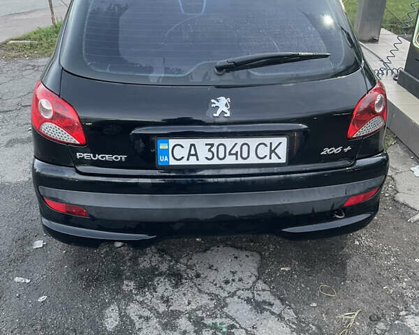 Черный Пежо 206, объемом двигателя 1.1 л и пробегом 335 тыс. км за 3200 $, фото 2 на Automoto.ua
