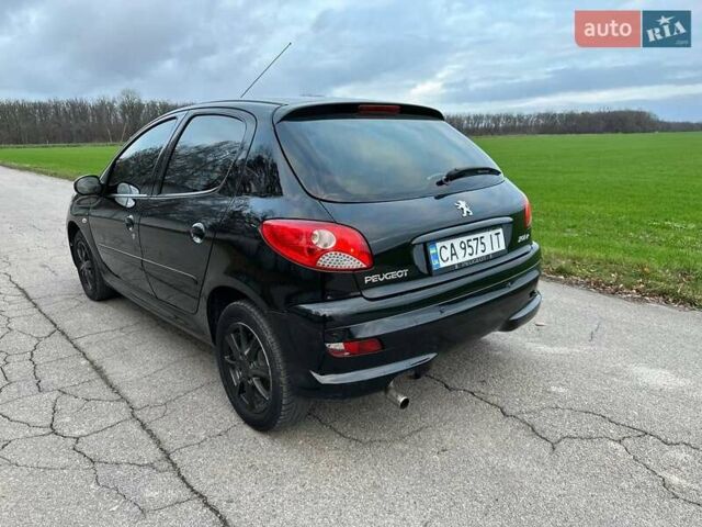 Чорний Пежо 206, об'ємом двигуна 1.4 л та пробігом 263 тис. км за 4300 $, фото 8 на Automoto.ua