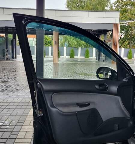 Черный Пежо 206, объемом двигателя 1.1 л и пробегом 130 тыс. км за 4250 $, фото 10 на Automoto.ua