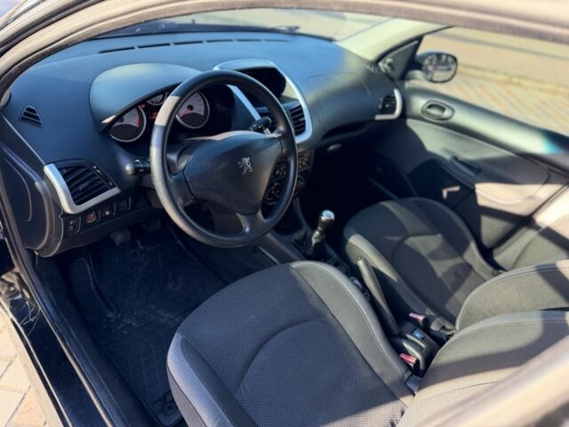 Черный Пежо 206, объемом двигателя 1.4 л и пробегом 152 тыс. км за 4500 $, фото 12 на Automoto.ua