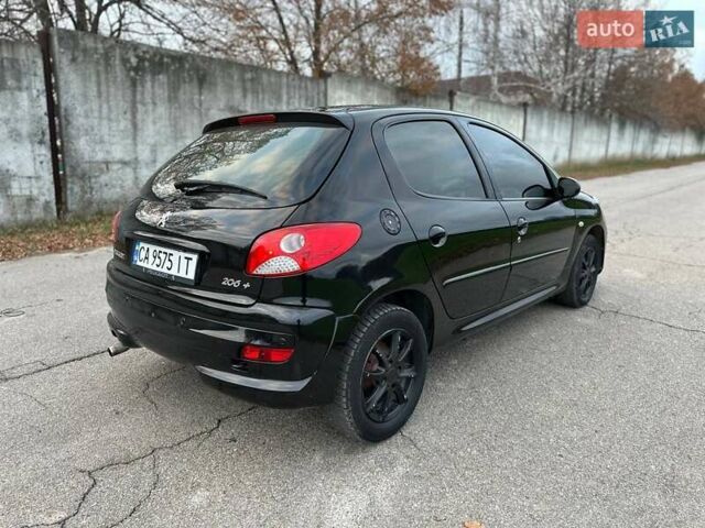 Чорний Пежо 206, об'ємом двигуна 1.4 л та пробігом 263 тис. км за 4300 $, фото 12 на Automoto.ua