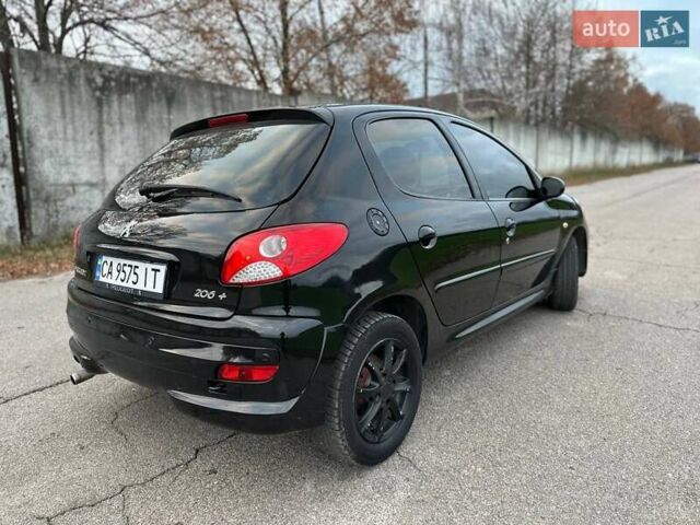 Чорний Пежо 206, об'ємом двигуна 1.4 л та пробігом 263 тис. км за 4300 $, фото 4 на Automoto.ua