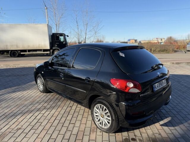 Черный Пежо 206, объемом двигателя 1.4 л и пробегом 152 тыс. км за 4500 $, фото 9 на Automoto.ua