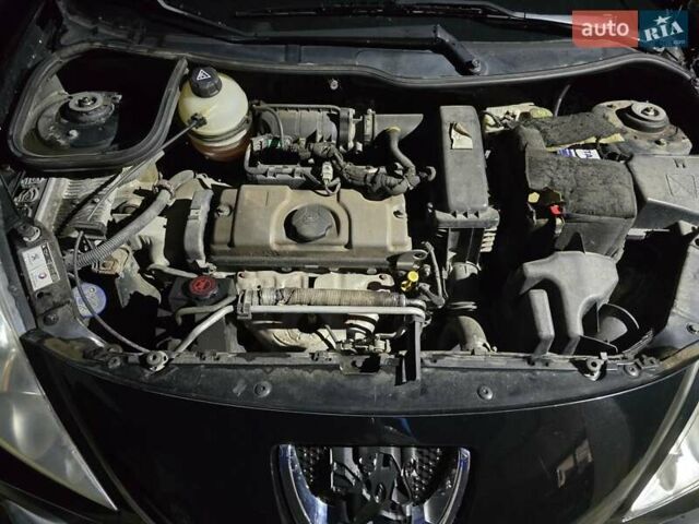 Черный Пежо 206, объемом двигателя 1.36 л и пробегом 150 тыс. км за 4600 $, фото 6 на Automoto.ua