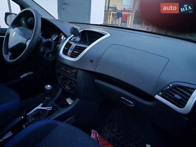 Черный Пежо 206, объемом двигателя 1.36 л и пробегом 150 тыс. км за 4600 $, фото 9 на Automoto.ua