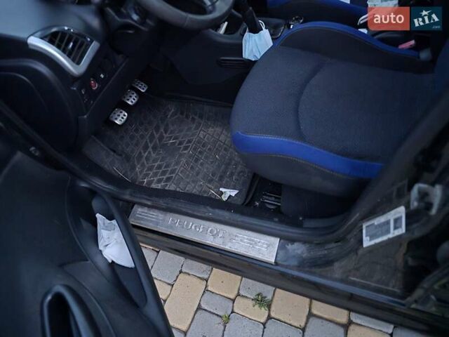 Черный Пежо 206, объемом двигателя 1.36 л и пробегом 150 тыс. км за 4600 $, фото 2 на Automoto.ua
