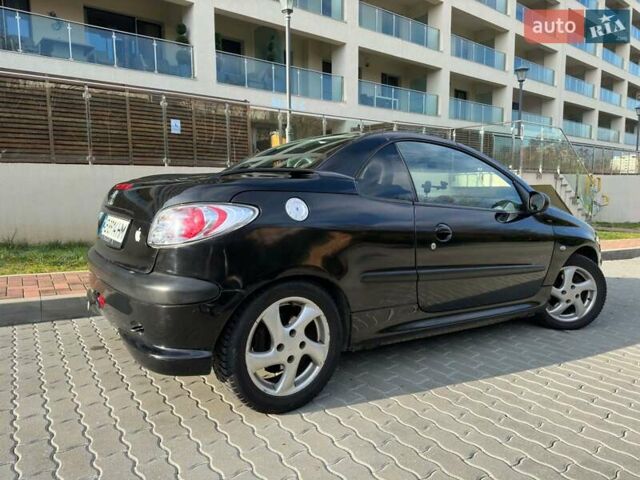 Черный Пежо 206, объемом двигателя 1.59 л и пробегом 231 тыс. км за 3600 $, фото 5 на Automoto.ua