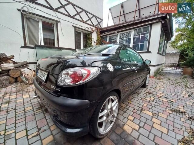 Черный Пежо 206, объемом двигателя 2 л и пробегом 238 тыс. км за 5000 $, фото 6 на Automoto.ua