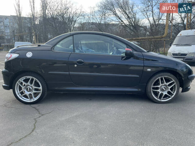 Черный Пежо 206, объемом двигателя 2 л и пробегом 238 тыс. км за 3400 $, фото 5 на Automoto.ua