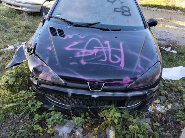 Черный Пежо 206, объемом двигателя 0 л и пробегом 10 тыс. км за 1100 $, фото 6 на Automoto.ua