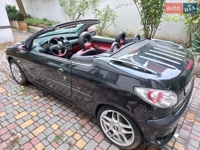 Черный Пежо 206, объемом двигателя 2 л и пробегом 238 тыс. км за 5000 $, фото 3 на Automoto.ua