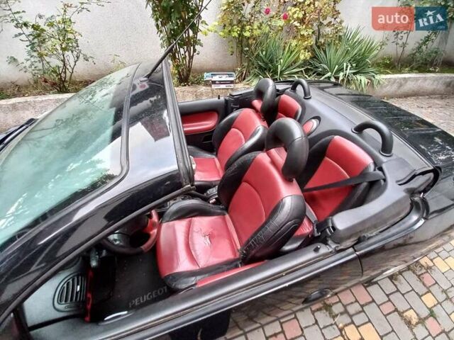 Черный Пежо 206, объемом двигателя 2 л и пробегом 238 тыс. км за 5000 $, фото 11 на Automoto.ua
