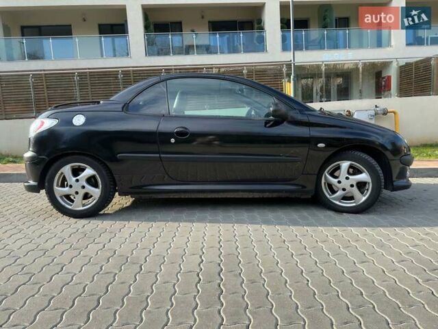 Черный Пежо 206, объемом двигателя 1.59 л и пробегом 231 тыс. км за 3600 $, фото 6 на Automoto.ua